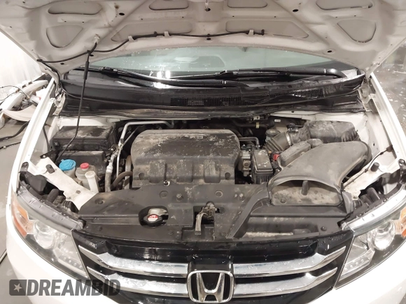 2015 Honda Odyssey Touring Elite with VIN 5FNRL5H92FB020159, listed as a IAAI auction lot 42103240 with 79,322 mi miles and . Bid and sale history available at DreamBid. Image 10.