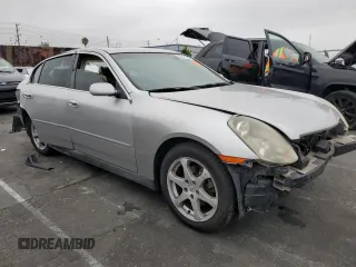 2003 Infiniti G35 w/Leather with VIN JNKCV51E73M016617, listed as a Copart auction lot 60571025 with 244,954 mi miles and Salvage title. Bid and sale history available at DreamBid. Image 4.
