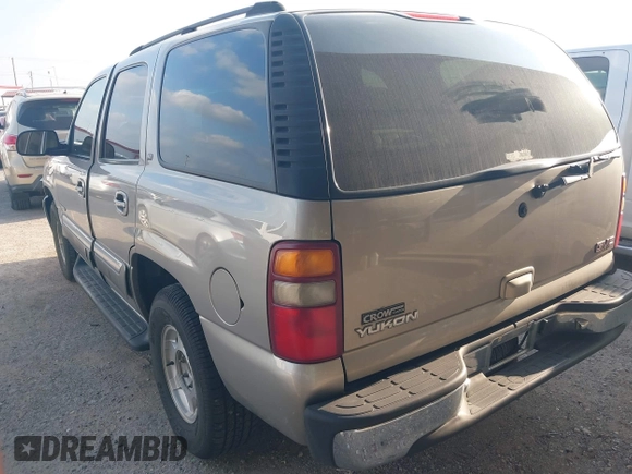 2003 GMC Yukon SLT with VIN 1GKEC13Z43R163266, listed as a IAAI auction lot 41540592 with 173,804 mi miles. Bid and sale history available at carsss.com. Image 3.