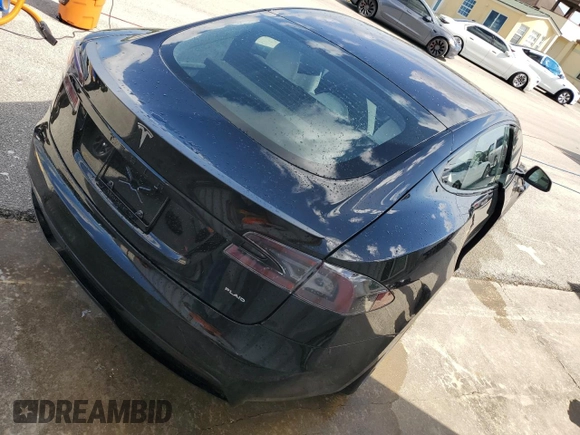 2022 Tesla Model S Plaid z VIN 5YJSA1E64NF461218, wystawiony jako Copart lot #74178794 z przebiegiem Nie podano mil oraz Szkoda całkowita • Salvage title. Historia ofert i sprzedaży dostępna na DreamBid. Obrazek 3.