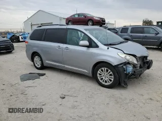 2014 Toyota Sienna XLE with VIN 5TDYK3DC2ES434962, listed as a Copart auction lot 50240815 with 150,503 mi miles and Salvage Title. Bid and sale history available at carsss.com. Image 4.