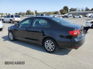 2015 Volkswagen Jetta SE with VIN 3VWD17AJ2FM314637, listed as a Copart auction lot 59715185 with 181,247 mi miles and Salvage title. Bid and sale history available at DreamBid. Image 2.