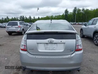 2006 Toyota Prius z VIN JTDKB20U967074471, wystawiony jako IAAI lot #42332013 z przebiegiem 303 162 mil mil oraz . Historia ofert i sprzedaży dostępna na DreamBid. Obrazek 14.