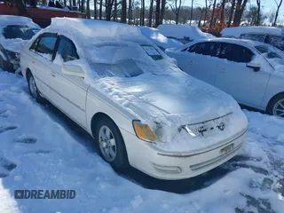 2001 Toyota Avalon XL w/Bucket Seats with VIN 4T1BF28B31U159772, listed as a IAAI auction lot 41622587 with 175,456 mi miles. Bid and sale history available at carsss.com. Image 1.