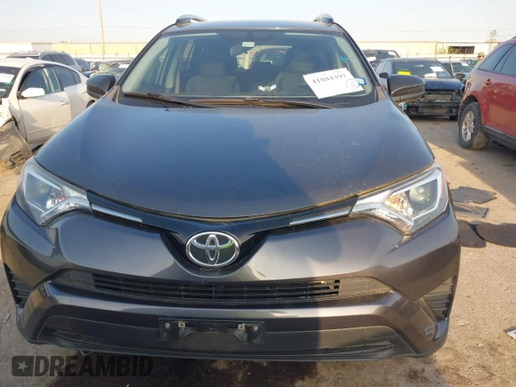 2016 Toyota RAV4 LE with VIN JTMZFREV5GJ097330, listed as a IAAI auction lot 41884397 with 107,699 mi miles. Bid and sale history available at carsss.com. Image 12.