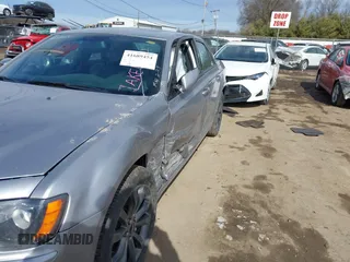 2014 Chrysler 300 with VIN 2C3CCAGG7EH255782, listed as a IAAI auction lot 41689454 with 148,912 mi miles. Bid and sale history available at carsss.com. Image 6.