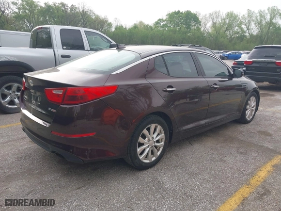 2014 Kia Optima EX with VIN 5XXGN4A71EG321621, listed as a IAAI auction lot 42077320 with 169,372 mi miles. Bid and sale history available at carsss.com. Image 4.