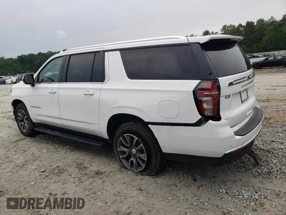 2021 Chevrolet Suburban LS with VIN 1GNSCBKD5MR392512, listed as a Copart auction lot 71238124 with 77,775 mi miles and Salvage Title. Bid and sale history available at DreamBid. Image 2.