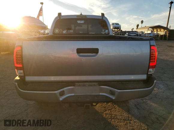 2014 Toyota Tacoma PreRunner with VIN 3TMKU4HNXEM041311, listed as a Copart auction lot 84065684 with 212,473 mi miles and Salvage title. Bid and sale history available at DreamBid. Image 6.