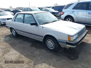 1985 Toyota Camry z VIN JT2SV16E9F0351378, wystawiony jako IAAI lot #41605627 z przebiegiem 192 476 mil mil oraz . Historia ofert i sprzedaży dostępna na DreamBid. Obrazek 1.