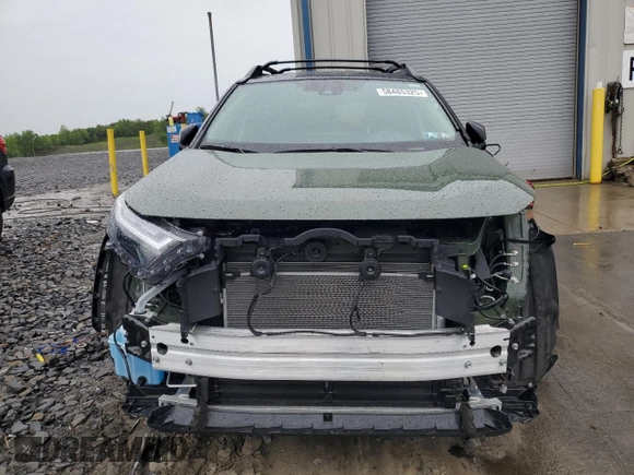2024 Toyota RAV4 Hybrid LE with VIN 2T3UWRFV2RW233698, listed as a Copart auction lot 58485325 with 6,873 mi miles and Salvage title. Bid and sale history available at DreamBid. Image 5.