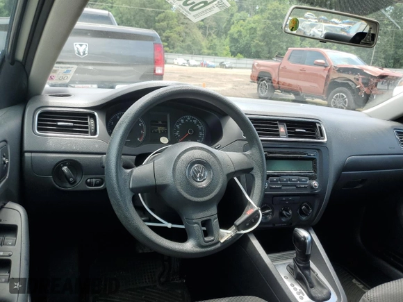 2014 Volkswagen Jetta S with VIN 3VW2K7AJ2EM240929, listed as a Copart auction lot 63842245 with 82,080 mi miles and Salvage title. Bid and sale history available at DreamBid. Image 8.