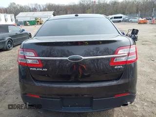 2013 Ford Taurus SEL with VIN 1FAHP2E87DG220389, listed as a IAAI auction lot 41930118 with 128,324 mi miles and . Bid and sale history available at carsss.com. Image 16.
