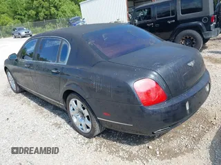 2006 Bentley Flying Spur z VIN SCBBR53W06C039791, wystawiony jako IAAI lot #42295068 z przebiegiem 48 739 mil mil oraz . Historia ofert i sprzedaży dostępna na DreamBid. Obrazek 3.