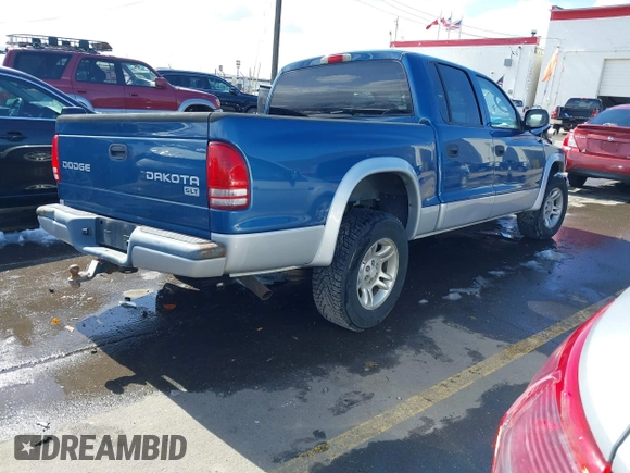 2003 Dodge Dakota SLT with VIN 1D7HL48N73S333828, listed as a IAAI auction lot 41748642 with 163,258 mi miles. Bid and sale history available at carsss.com. Image 4.
