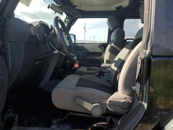 2010 Jeep Wrangler Rubicon with VIN 1J4BA6D10AL109001, listed as a Copart auction lot 69453954 with 137,821 mi miles and Salvage title. Bid and sale history available at DreamBid. Image 7.