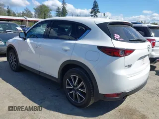2017 Mazda CX-5 Grand Touring with VIN JM3KFBDL9H0163031, listed as a IAAI auction lot 42098819 with 81,781 mi miles. Bid and sale history available at carsss.com. Image 3.