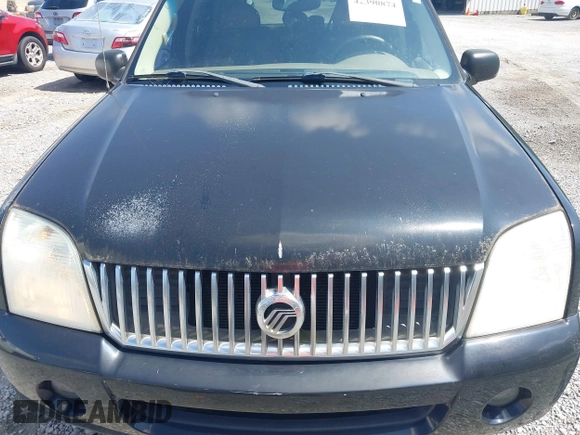 2003 Mercury Mountaineer Convenience z VIN 4M2DU86K43ZJ10878, wystawiony jako IAAI lot #42390874 z przebiegiem 194 867 mil mil oraz . Historia ofert i sprzedaży dostępna na DreamBid. Obrazek 6.