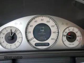2006 Mercedes-Benz CLK 500 z VIN WDBTJ75J16F169856, wystawiony jako Copart lot #59345235 z przebiegiem 209 777 mil mil oraz Czysty tytuł • Clean title. Historia ofert i sprzedaży dostępna na DreamBid. Obrazek 9.