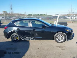 2014 Mazda 3 i Grand Touring with VIN JM1BM1M70E1211906, listed as a IAAI auction lot 41878585 with 112,013 mi miles and . Bid and sale history available at DreamBid. Image 13.