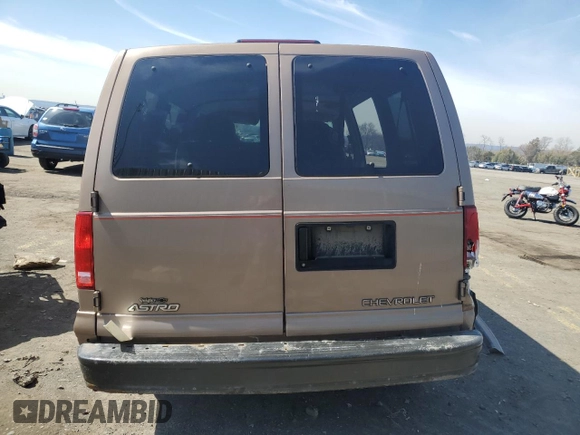 1998 Chevrolet Astro with VIN 1GNEL19W7WB182424, listed as a Copart auction lot 49575185 with 131,741 mi miles and Salvage Title. Bid and sale history available at carsss.com. Image 6.