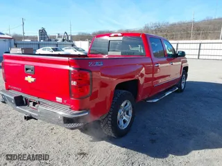 2014 Chevrolet Silverado 1500 LT with VIN 3GCUKREC5EG126926, listed as a IAAI auction lot 41455824 with 151,101 mi miles. Bid and sale history available at carsss.com. Image 4.