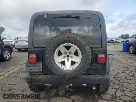 2000 Jeep Wrangler Sahara with VIN 1J4FA59S5YP761127, listed as a Copart auction lot 65247225 with 174,274 mi miles and Clean title. Bid and sale history available at DreamBid. Image 6.