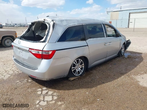2012 Honda Odyssey EX-L with VIN 5FNRL5H64CB136514, listed as a IAAI auction lot 41837755 with 175,844 mi miles. Bid and sale history available at carsss.com. Image 4.