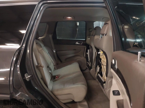2011 Jeep Grand Cherokee 70th Anniversary with VIN 1J4RR4GG3BC566690, listed as a IAAI auction lot 41810545 with 173,886 mi miles. Bid and sale history available at carsss.com. Image 8.