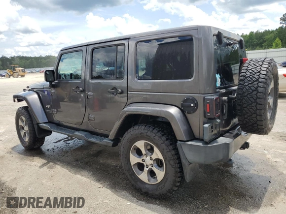 2016 Jeep Wrangler Unlimited Sahara с VIN 1C4BJWEG5GL221827, выставлен на аукционе Copart как лот 60411625 с пробегом 65 405 миль миль и Списание • Salvage title. История ставок и продаж доступна на DreamBid. Изображение 2.