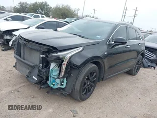 2023 Cadillac XT4 FWD Luxury with VIN 1GYAZAR49PF128552, listed as a IAAI auction lot 41806172 with 36,081 mi miles and . Bid and sale history available at carsss.com. Image 18.