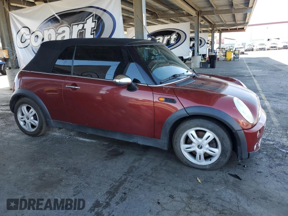 2007 MINI Convertible with VIN WMWRF33537TG17447, listed as a Copart auction lot 59015995 with 137,032 mi miles and Salvage title. Bid and sale history available at DreamBid. Image 4.