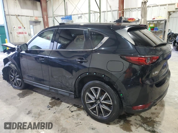 2018 Mazda CX-5 Grand Touring with VIN JM3KFADM3J0325843, listed as a Copart auction lot 87958375 with 93,577 mi miles and Salvage title. Bid and sale history available at DreamBid. Image 2.