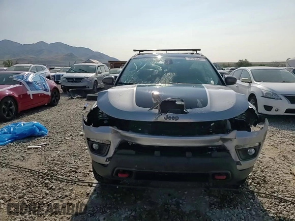 2019 Jeep Compass Trailhawk with VIN 3C4NJDDB9KT668858, listed as a Copart auction lot 58603645 with 74,226 mi miles and Salvage title. Bid and sale history available at DreamBid. Image 14.
