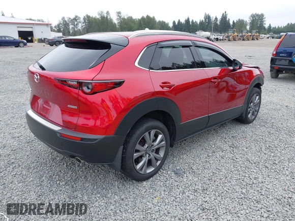 2023 Mazda CX-30 S Premium with VIN 3MVDMBDM1PM520048, listed as a IAAI auction lot 42468172 with 7,277 mi miles and . Bid and sale history available at DreamBid. Image 4.