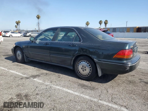 1996 Acura RL with VIN JH4KA965XTC009917, listed as a Copart auction lot 65083665 with 197,486 mi miles and Salvage title. Bid and sale history available at DreamBid. Image 2.