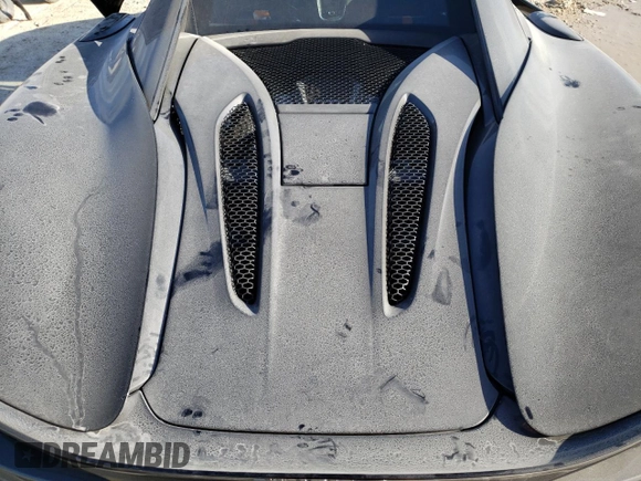 2017 McLaren 570S z VIN SBM13DAA3HW003517, wystawiony jako Copart lot #37948714 z przebiegiem 7587 mil mil oraz . Historia ofert i sprzedaży dostępna na DreamBid. Obrazek 13.