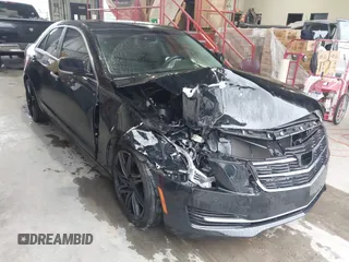 2017 Cadillac ATS Luxury RWD z VIN 1G6AB5SX9H0126992, wystawiony jako IAAI lot #42413564 z przebiegiem Nie podano mil oraz . Historia ofert i sprzedaży dostępna na DreamBid. Obrazek 1.