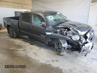 2014 Toyota Tacoma z VIN 3TMMU4FN4EM071741, wystawiony jako Copart lot #49235015 z przebiegiem 60 825 mil mil oraz Szkoda całkowita • Salvage title. Historia ofert i sprzedaży dostępna na DreamBid. Obrazek 4.