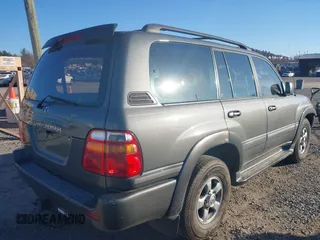 2002 Toyota Land Cruiser with VIN JTEHT05J122022183, listed as a IAAI auction lot 41440395 with 288,686 mi miles. Bid and sale history available at carsss.com. Image 4.