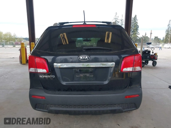 2011 Kia Sorento LX with VIN 5XYKTDA24BG170561, listed as a IAAI auction lot 42011756 with 211,833 mi miles. Bid and sale history available at carsss.com. Image 16.