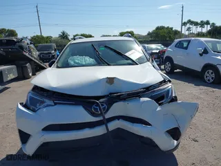 2017 Toyota RAV4 LE with VIN JTMZFREV7HJ143483, listed as a IAAI auction lot 41804683 with 129,319 mi miles. Bid and sale history available at carsss.com. Image 6.