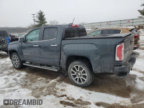2021 GMC Canyon 4WD Denali with VIN 1GTG6EENXM1199427, listed as a Copart auction lot 86018624 with 98,520 mi miles and Salvage Title. Bid and sale history available at carsss.com. Image 2.