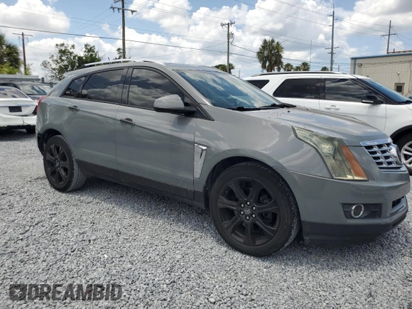 2014 Cadillac SRX Premium Collection z VIN 3GYFNGE30ES627895, wystawiony jako Copart lot #58605985 z przebiegiem 49 300 mil mil oraz Szkoda całkowita • Salvage title. Historia ofert i sprzedaży dostępna na DreamBid. Obrazek 4.