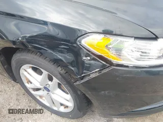 2014 Ford Fusion SE with VIN 3FA6P0H79ER243908, listed as a IAAI auction lot 41749834 with 217,196 mi miles. Bid and sale history available at carsss.com. Image 6.