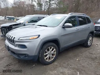 2016 Jeep Cherokee Latitude with VIN 1C4PJMCB4GW203710, listed as a IAAI auction lot 42017248 with 216,117 mi miles. Bid and sale history available at carsss.com. Image 17.