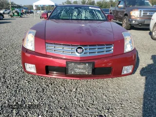 2006 Cadillac XLR z VIN 1G6YV36A465601366, wystawiony jako Copart lot #76229944 z przebiegiem 33 159 mil mil oraz Nie do naprawy. Historia ofert i sprzedaży dostępna na DreamBid. Obrazek 5.