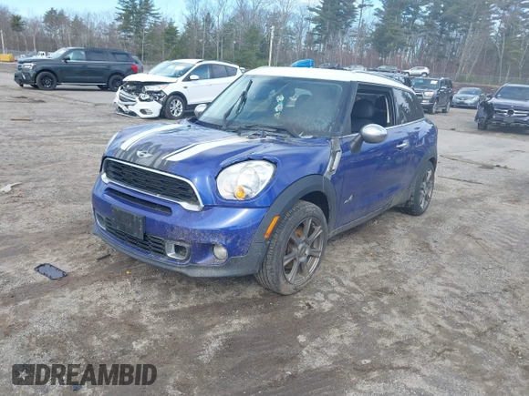 2014 MINI Paceman S with VIN WMWSS7C51EWN72179, listed as a IAAI auction lot 41823211 with 117,151 mi miles and . Bid and sale history available at DreamBid. Image 2.