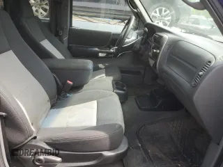 2006 Ford Ranger XL z VIN 1FTZR15EX6PA75411, wystawiony jako Copart lot #58711315 z przebiegiem 153 555 mil mil oraz Czysty tytuł • Clean title. Historia ofert i sprzedaży dostępna na DreamBid. Obrazek 10.