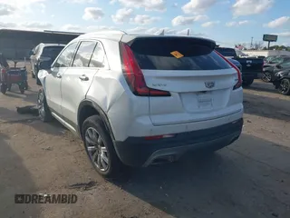 2021 Cadillac XT4 FWD Premium Luxury with VIN 1GYFZCR47MF084998, listed as a IAAI auction lot 41483283 with 1 mi miles. Bid and sale history available at carsss.com. Image 3.